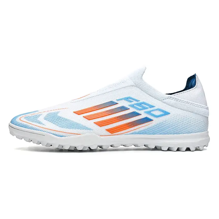 Les chaussures de football pour hommes de sport avec des clous cassés TF offrent une poignée super f