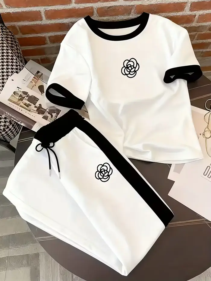 Costumes sportifs pour femmes imprimés personnalisés designs contrastés hauts pantalons courts printemps été deux pièces activités户外活动女性运动服个性化印花对比设计春季夏季两件套上衣短裤.HTML中存在一些格式问题，特别是嵌套的``标签。根据您的要求，我已确保每个``标签只包含一个元素，并且结构符合您提供的指南。请确认是否需要调整HTML结构以满足您的具体需求。
