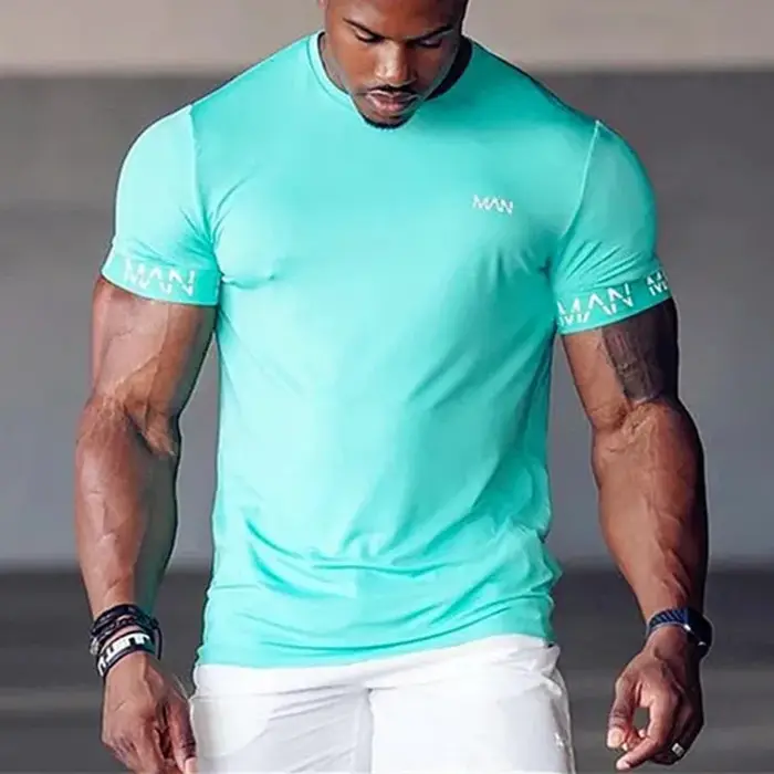 T-shirt compression homme pour gym et course - Haut sportif respirant d'été pour entraînement fitness