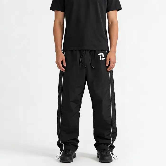 Pantalon de survêtement d'entraînement de fitness pour homme noir avec rayures latérales blanches imprimé géométrique pour sport et loisirs