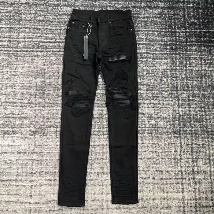 jeans noirs skinny en cuir côtelé pour hommes