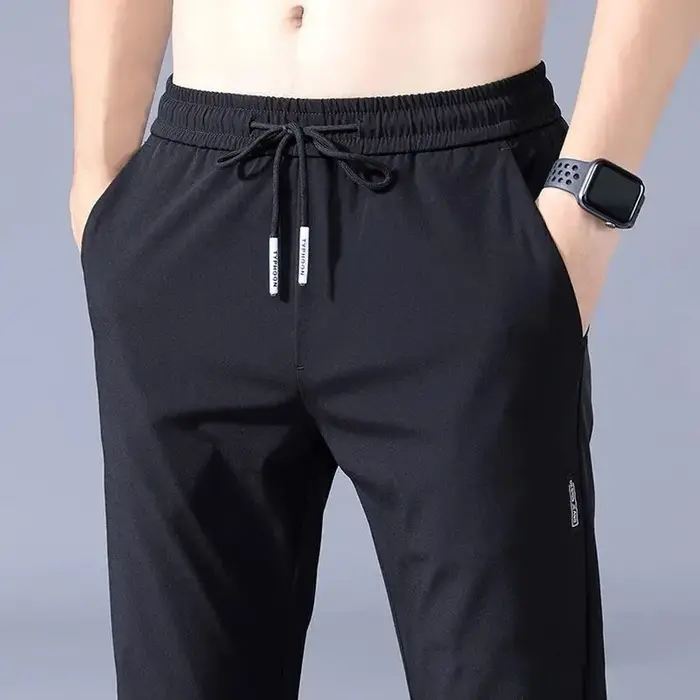 Pantalons hommes 2025 été noir gris élastique respirant coupe moderne pour activités extérieures et tenues décontractées