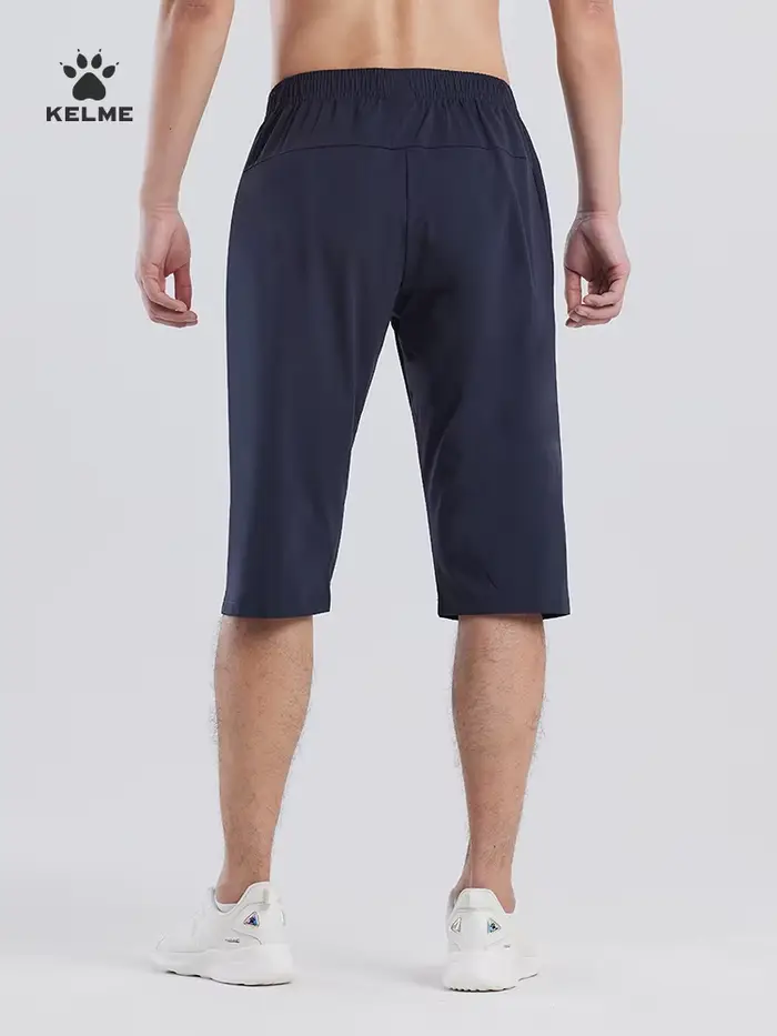 Capris de sport Kelme respirants homme - Short fitness football et course été