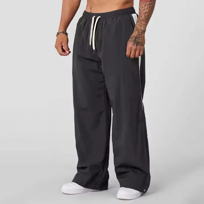 Pantalon de survêtement ample et décontracté pour homme jambes larges tendance sport épissage respirant nouvelle collection automne 2025