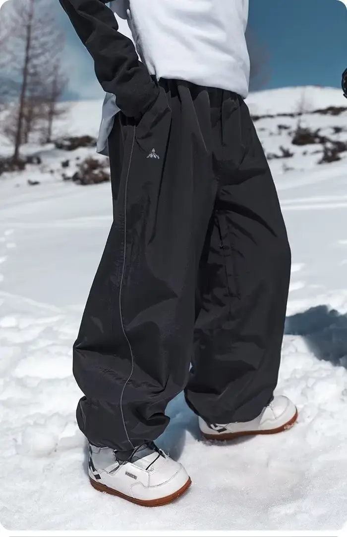 Pantalon de ski imperméable coupe ample double planche résistant à l'usure pour hommes et femmes occasions spéciales descentes de ski compétitions